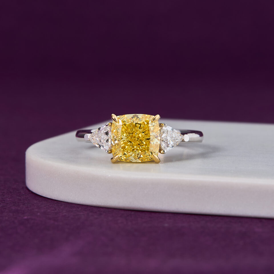 3.00 CT Fancy Yellow centre diamond ring
